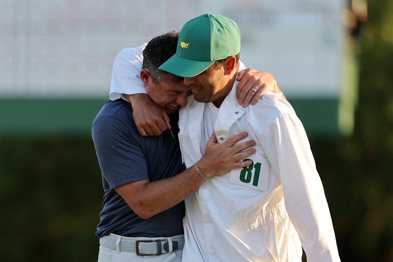Rory McIlroy with caddie Harry Diamond after the playoff hole during the final round of the 2025 Masters. Photograph: Michael Reaves/Getty Images
