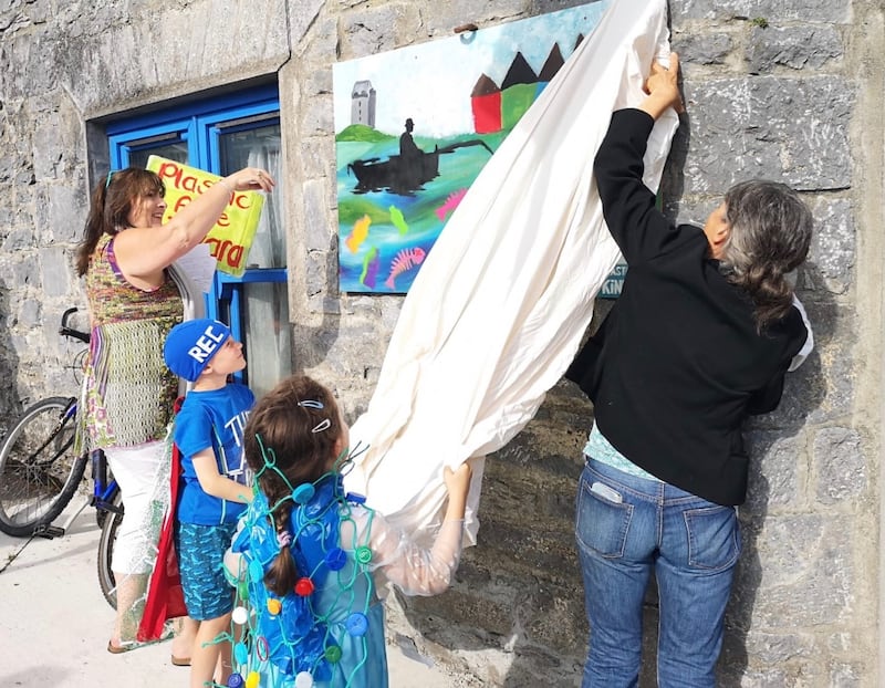 Unveiling one of the billboards for Plastic-free Kinvara, freom left Catherine Dunne, Cian Sammon, Sophie O’Grady and Anna Murphy. Photograph: Louise O’Neill Vance