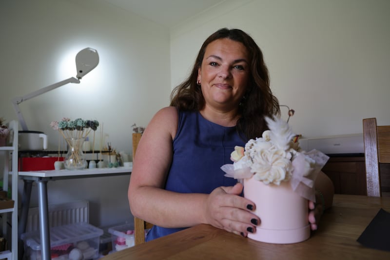 Candlemaker Sanja Ivcic at home in Carrigaline, Co Cork, with one of her creations. Photograph: Bryan O’Brien