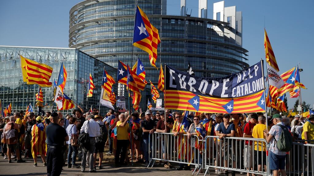 Supporters of Catalan independence protest outside the European Parliament in Strasbourg on Tuesday  at the fact that three elected Catalan MEPs were not allowed to take their seats for its inaugural session. Photograph: Vincent Kessler/Reuters