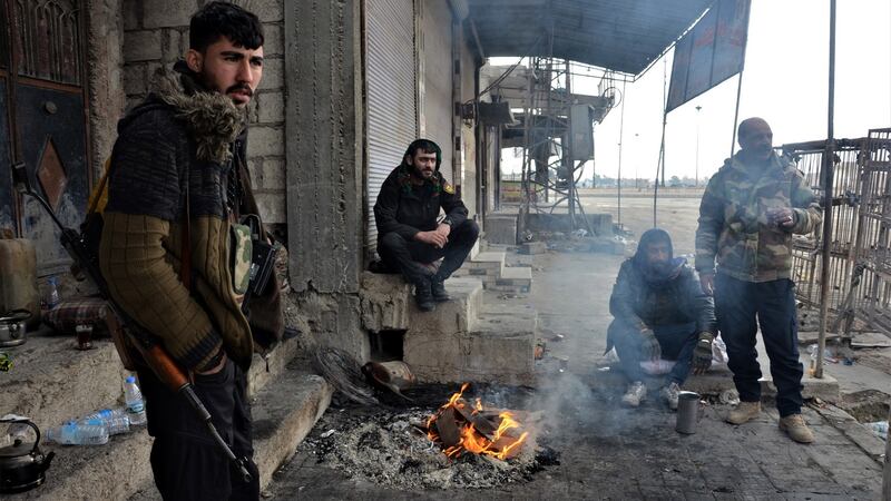 Fighters of the Syrian Democratic Forces during a  search operation in Hasaka on Monday. Photograph: Ahmed Mardnli/EPA