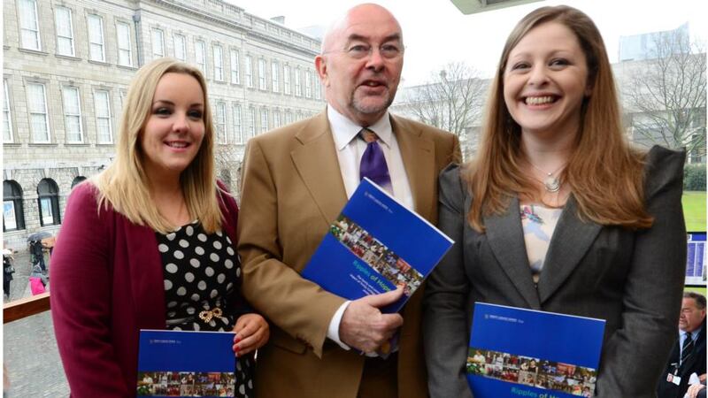Minister for Education Ruairí Quinn, with TAP graduates  Lyndsey Johnson and Siobhan O'Brien,  launches a report marking 20 years of the Trinity Access Programme. Photograph: Bryan O'Brien