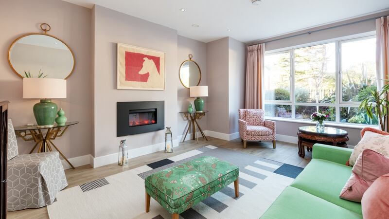 Downstairs is laid out with a formal living room to the front.