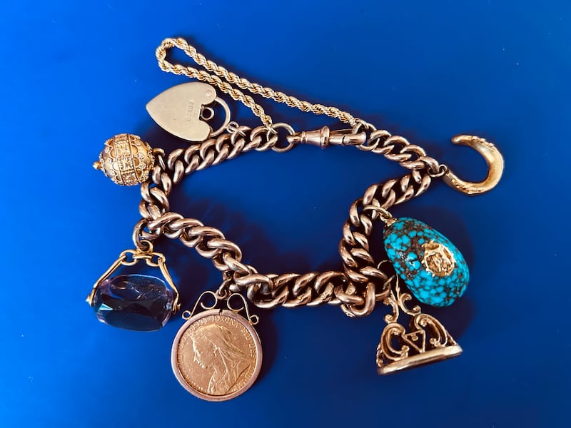 The gold charm bracele