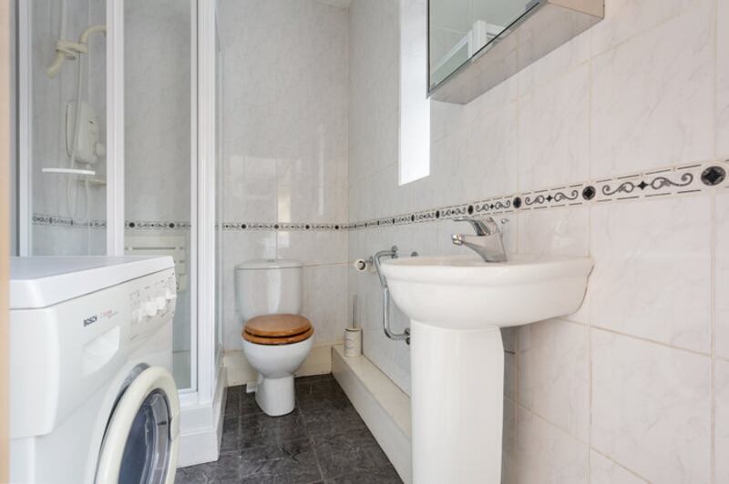 The shower and utility room of 27 Courtney House, on Appian Way in Dublin 6