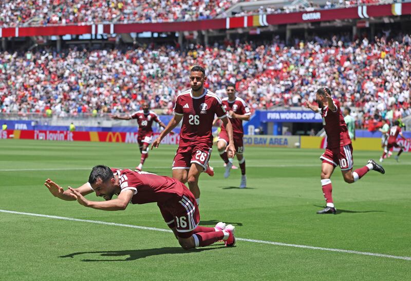 Boualem Khoukhi of Qatar celebrates scoring his team's first goal during the World Cup Group B match between Qatar and Switzerland at San Francisco Bay Area Stadium on Saturday in Santa Clara, California. Photograph: Emilee Chinn/Getty Images