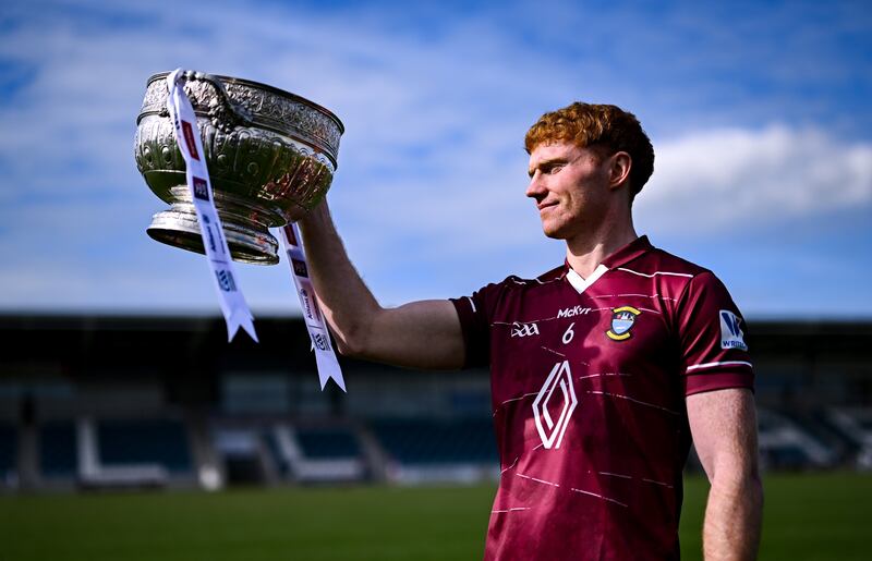 Ronan Wallace with the Delaney Cup at the launch of the 2025 Leinster GAA Senior Football Championship in Cedral St Conleth's Park, Newbridge. Photograph: Piaras Ó Mídheach/Sportsfile