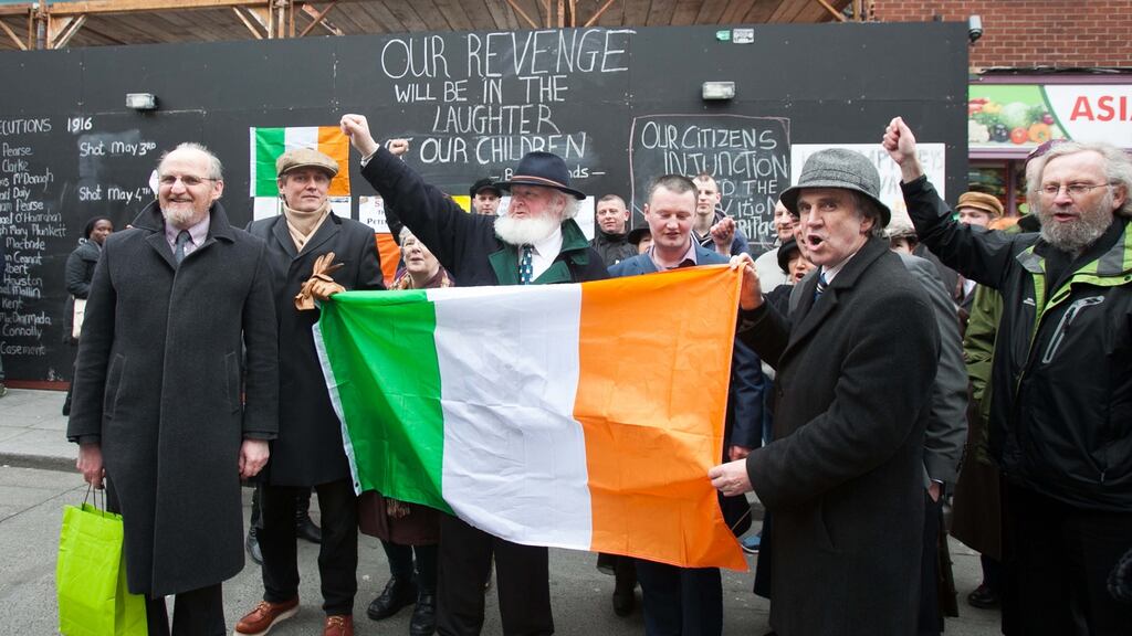 Members of the Save 16 Moore Street campaign Eamonn Ceant, Paddy Cooney, Helen Litton, Proinsias Ó Rathaille, Colm Moore, James Connolly Heron on 16 Moore Street following the announcement that the High Court has declared that the area the street, should be declared a national monument. Photograph: Gareth Chaney Collins