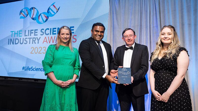 Eamon Judge, executive director, global engineering of Eli Lilly and Company, presents the best use of CSR award to the AbbVie team. Photograph: Jospeh Carr Photography