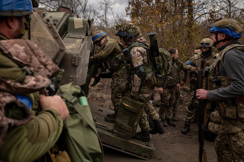 Ukrainian soldiers near Avdiivka, now the site of the fiercest fighting in eastern Ukraine. Photograph: Nicole Tung/New York Times
                      