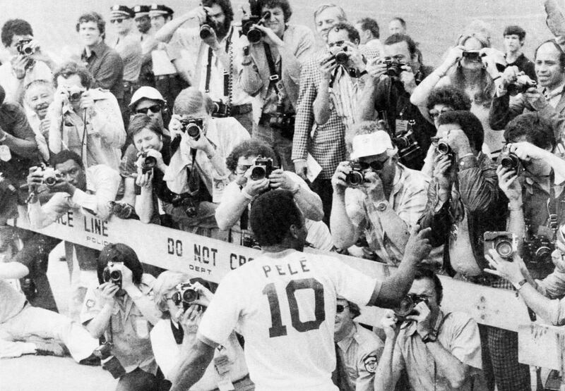 Pelé is the focus of the attention during his last game for New York Cosmos on October 1st, 1977. The Brazilian star joined the US team in 1975. Photograph: Domicio Pinheiro/4Imagens/Getty Images