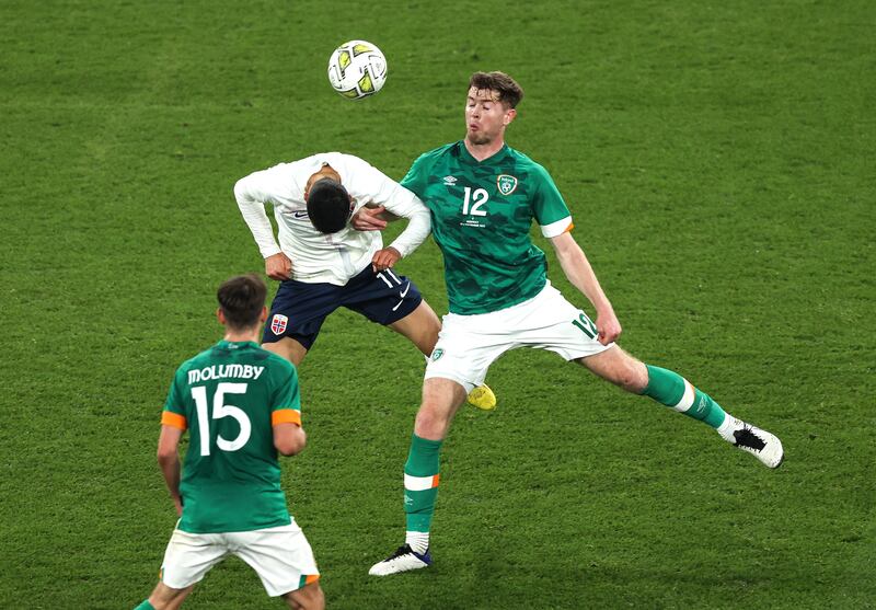 Norway's Mohamed Elyounoussi and Ireland's Nathan Collins in action at the Aviva Stadium. Photograph: Tom Maher/Inpho 