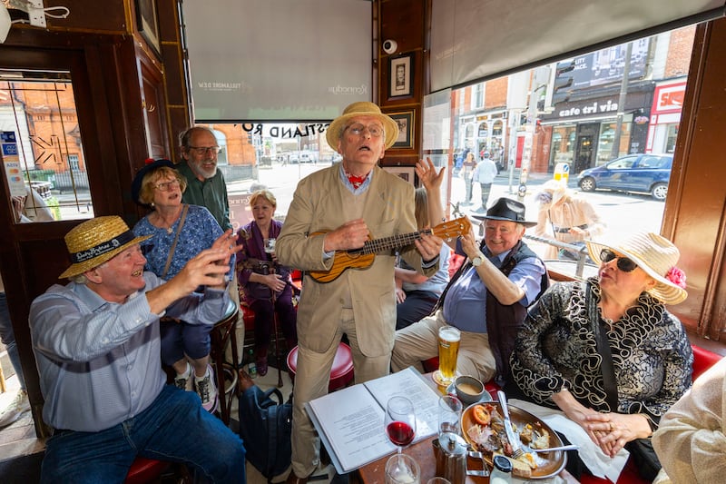 Brendan Byrne plays the ukulele in Kennedy’s, Westland Row, Dublin, during Bloomsday breakfast. Photograph: Tom Honan/The Irish Times