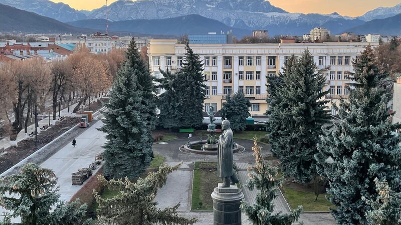 A statue of Vladimir Lenin overlooks a central square in Vladikavkaz, southern Russia, with the Caucasus mountains behind. Photograph: Daniel McLaughlin