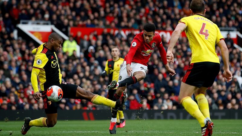 Mason Greenwood scores Manchester United’s  third goal  during the Premier League match against Watford at Old Trafford. Photograph: Martin Rickett/PA Wire