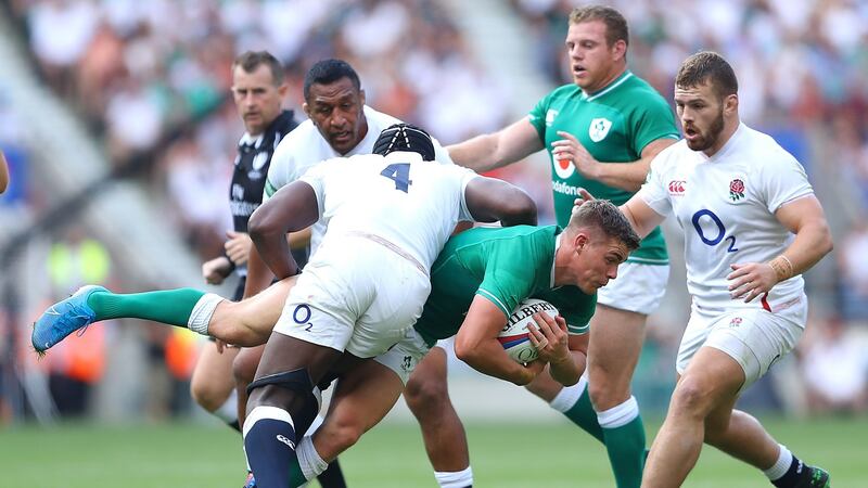 Maro Itoje tackles Garry Ringrose at Twickenham. Photograph: Warren Little/Getty
