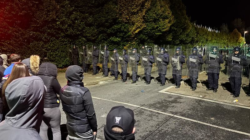 Officers block anti-asylum seeker protesters near the Citywest Hotel in Saggart, Dublin last year. Photograph: PA