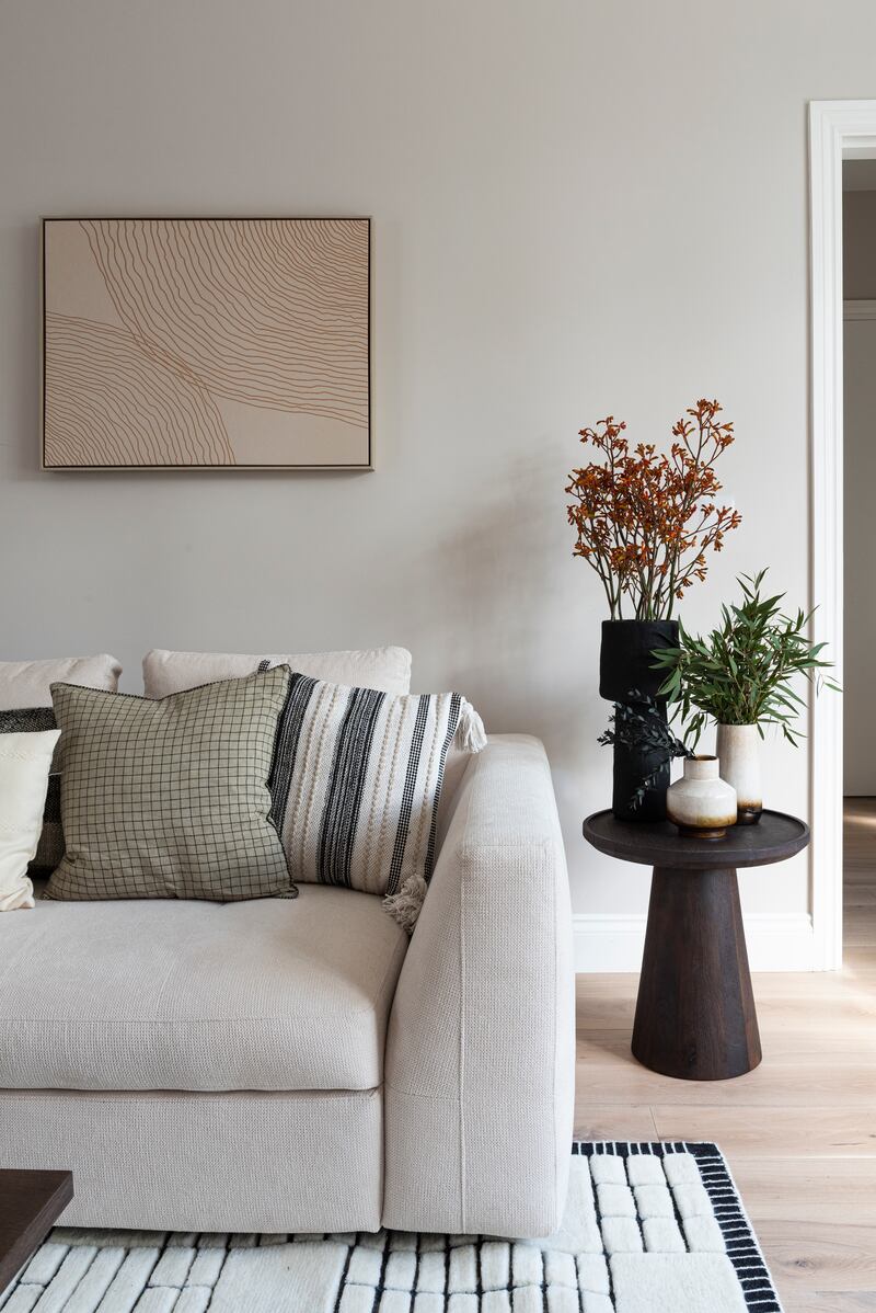 Don’t be too quick to dismiss the basic off-white paint your new home is likely to come with