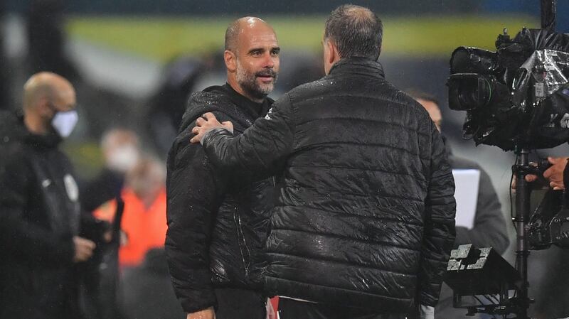 Manchester City manager Pep Guardiola talks to Leeds  United boss  Marcelo Bielsa after Saturday’s Premier League game at Elland Road. Photograph: Jason Cairnduff/EPA