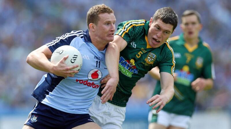 Dublin’s Ciarán Kilkenny holds off Meath’s Padraic Harnan during the Leinster football final. Photo: Donall Farmer/Inpho