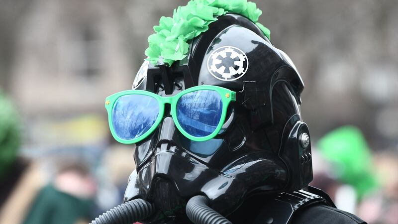 Thousands of people lined the Streets in Belfast for the St Patrick’s Day parade. Photograph: Colm Lenaghan/Pacemaker