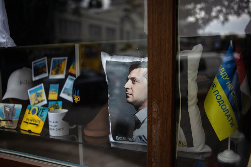 Patriotic mementos, including a cushion featuring an image of Ukraine president Volodymyr Zelenskiy, in the window of a store at the Privoz Market in Odesa, Ukraine. Photograph: Julia Kochetova/Bloomberg/Getty Images