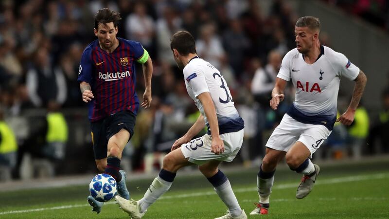 Barcelona’s Lionel Messi takes on  Tottenham Hotspur’s Ben Davies during the  Champions League Group B match at Wembley Stadium. Photograph: Nick Potts/PA Wire