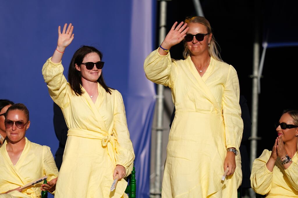 Leona Maguire and Anna Nordqvist wave to the crowd after they were announced as a foursomes pairing for the first morning's play at the Solheim Cup between Europe and the United States at Finca Cortesin Golf Club in Casares, Spain. Photograph: John Walton/PA Wire