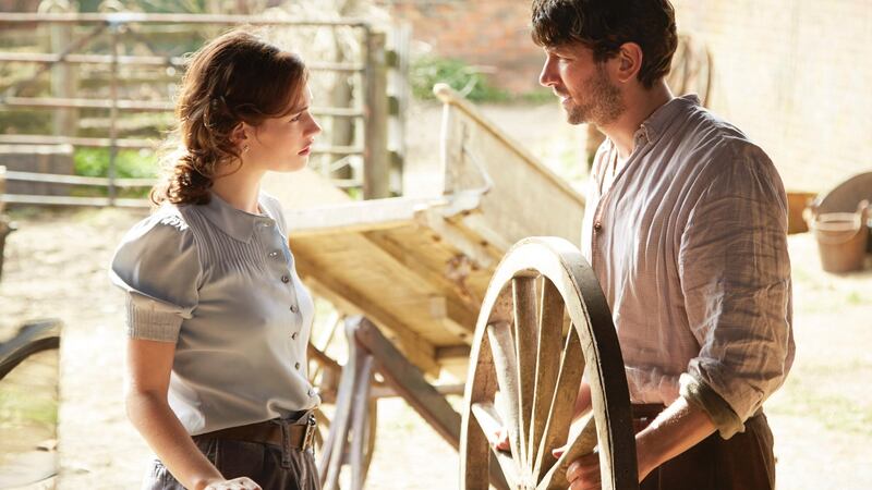 Potato appeal: Lily James and Michiel Huisman in The Guernsey Blah Blah Blah Blahdy Blah