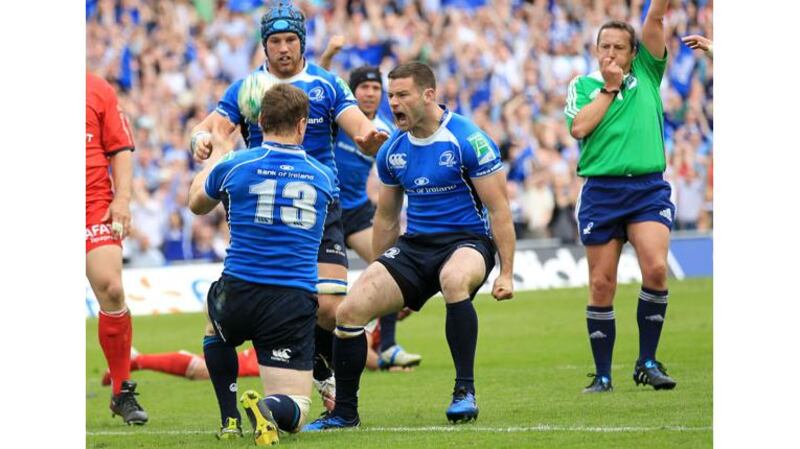 Fergus McFadden celebrates after Brian O'Driscoll scores a try for Leinster during their 2011 Heineken Cup semi-final win over Toulouse at the Aviva Stadium. Photograph: Billy Stickland/Inpho
