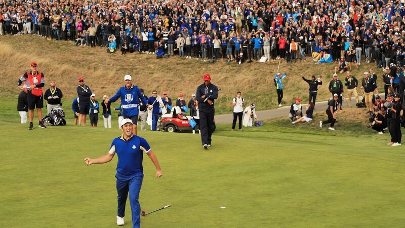 Jon Rahm celebrates winning his singles match against Tiger Woods at the Ryder Cup in Paris. Photograph:  Mike Ehrmann/Getty Images