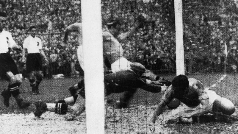 Italy’s Enrico Guaita scores the only goal of the 1934 World Cup final. Photograph:  Keystone/Hulton Archive/Getty
