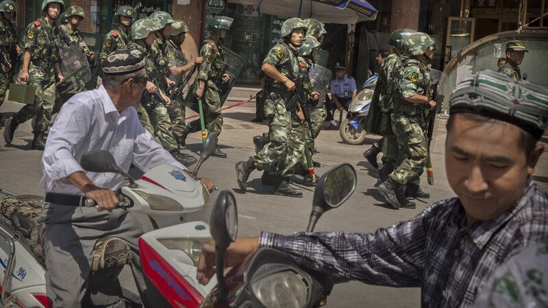 Chinese soldiers in Kashgar in Xinjiang:  UN human rights experts, European governments and academics have criticised the detentions of more than one million people from the mostly Muslim Uighur population. File photograph: Kevin Frayer/Getty Images
