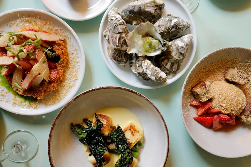 Notions: From left, radish, romesco, chive oil and hazelnuts; asparagus, guanciale, gnocchi, Parmesan and cavolo nero; Connemara oyster with jalapeño granita; caramelised white chocolate, strawberries and buckwheat sponge. Photograph: Alan Betson