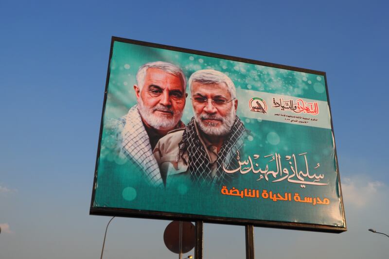 Top Iranian general Qasem Soleimani and Hashd commander Abu Mahdi al-Muhandis appear side by side on advertisement boards  dotted around Baghdad, hailed as heroes slain in their prime. They were killed by a US drone attack in 2022.  Photograph: Lorraine Mallinder