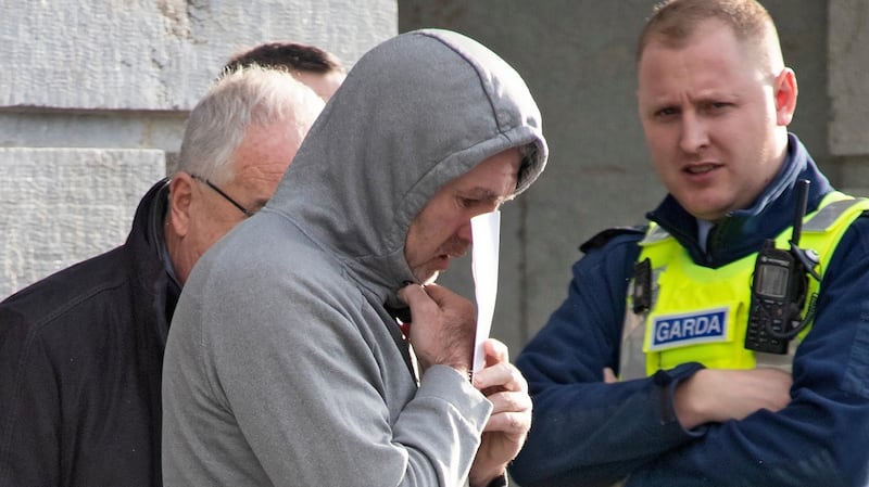 Bernard Joyce (centre, wearing grey hoodie)  pictured  leaving Mullingar District Court. Photograph: Colin Keegan, Collins Dublin