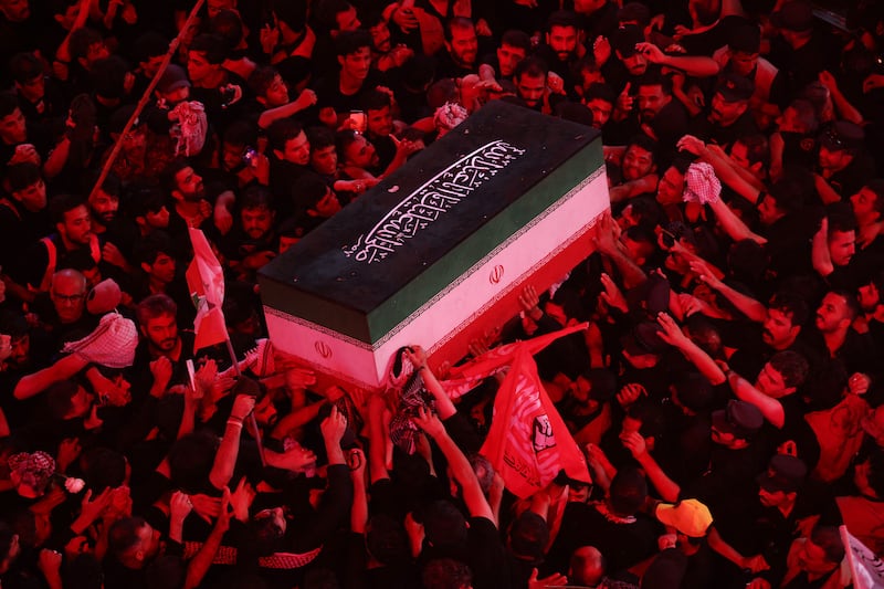 Mourners at the funeral procession of Iran's late supreme leader Ayatollah Ali Khamenei at Imam Hussein Shrine in Karbala, Iraq. Photograph:  Ahmad Al-Rubaye/AFP via Getty Images