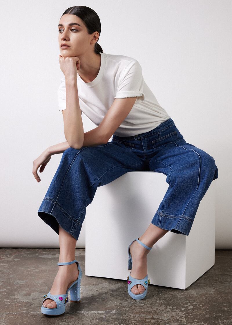 Soeur white cotton t-shirt €100, cropped flared jeans €215 with blue suede embellished platforms €360 from Nicki Hoyne