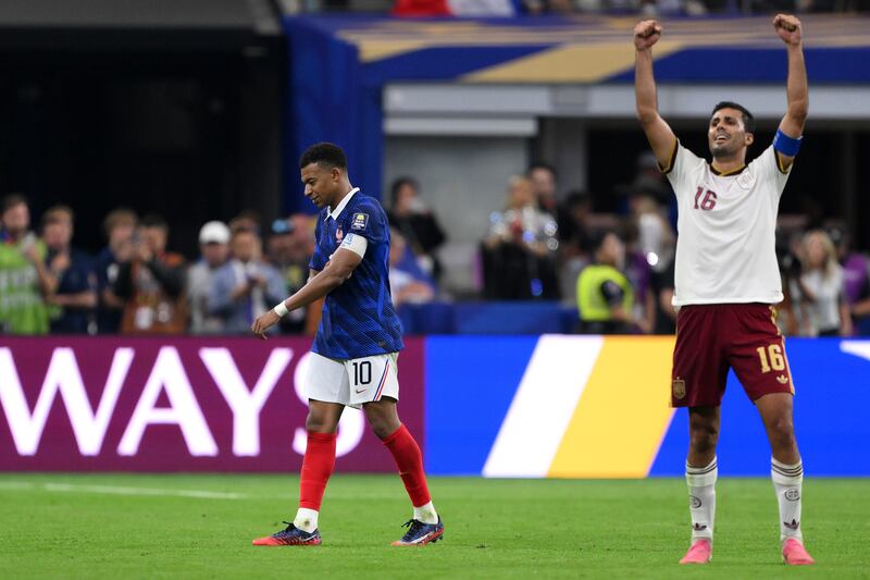 Kylian Mbappé of France after the 0-2 loss as Rodri of Spain celebrates during the Fifa World Cup 2026 semi-final match between France and Spain. Photograph: David Ramos/Getty Images