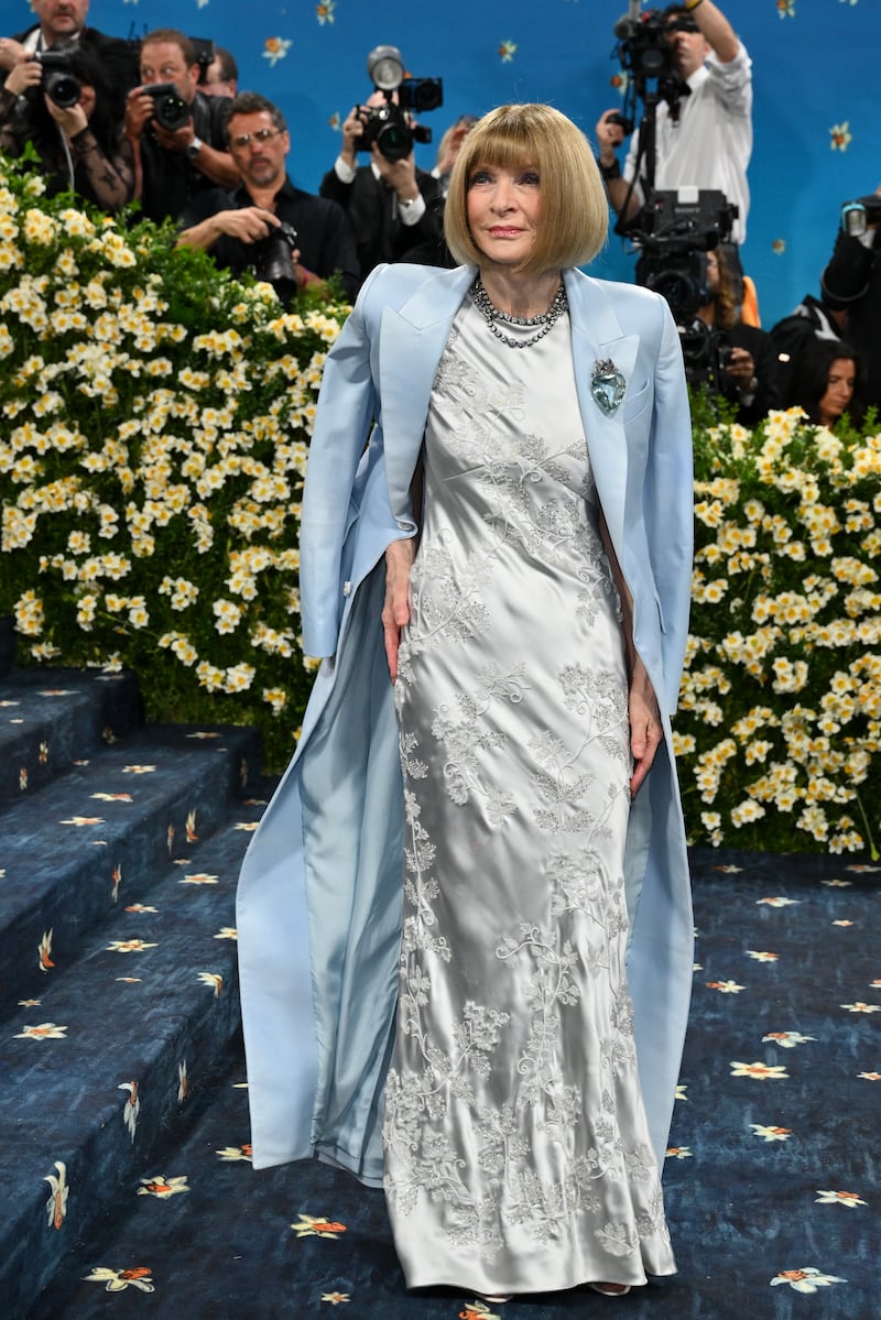 Anna Wintour in icy blue. Photograph: Angela Weiss/AFP