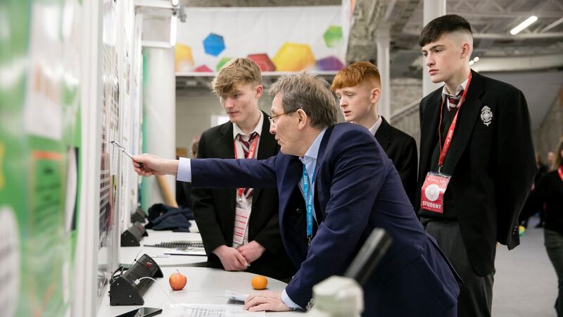 Niall Skehan, Luke Skehan and Darragh McMorrow from CBS Secondary School Kilkenny being judged on their project: The correlation between memory and the senses.  Photograph: Chris Bellew/Fennell Photography