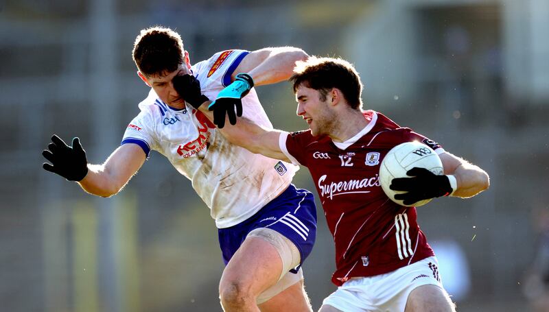 Monaghan’s Darren Hughes and Cathal Sweeney of Galway. Photograph: Ryan Byrne/Inpho