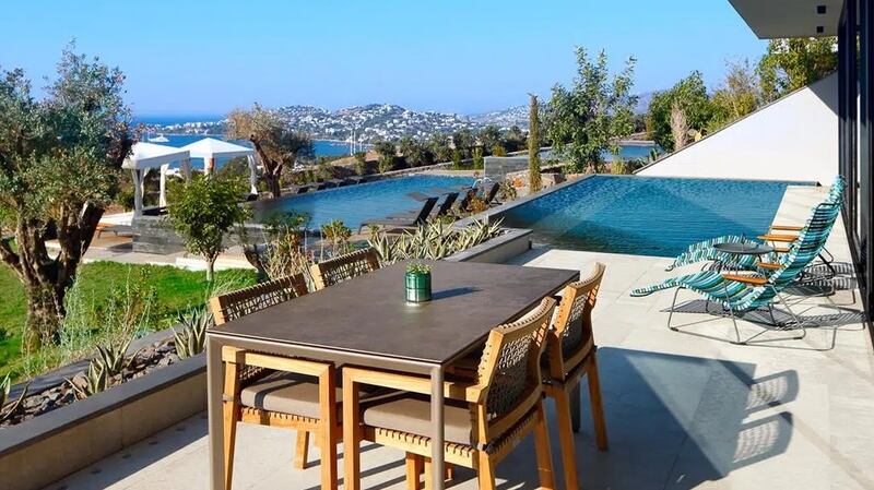 This two-bed apartment in Bodrum boasts  wonderful views of the surrounding countryside and the Aegean Sea