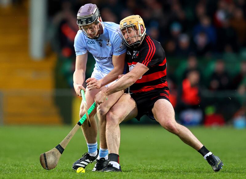 Na Piarsaigh's James Finn is challenged by  Ballygunner's Peter Hogan. Photograph: Tom O'Hanlon/Inpho
