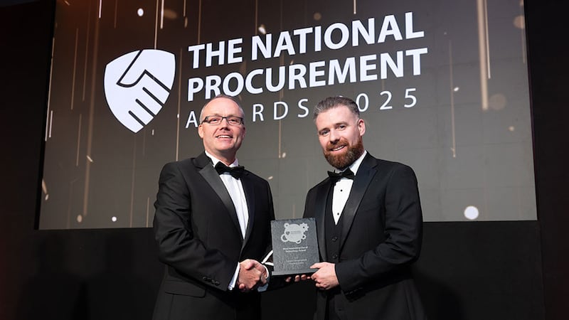 Niall O' Halloran, awards judge, presents the most innovative use of technology award to Edward Fagan, Compass Group Ireland.