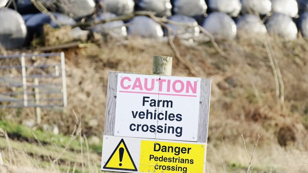 Farm vehicles and tractors crossing danger and warning sign