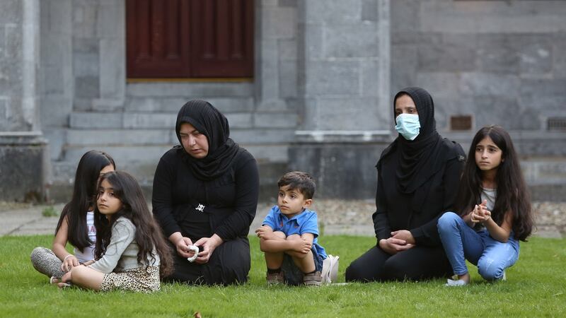 People attending the remembrance service for Karzan, Shahen and their baby daughter Lina at NUI Galway. Photograph: Joe O’Shaughnessy