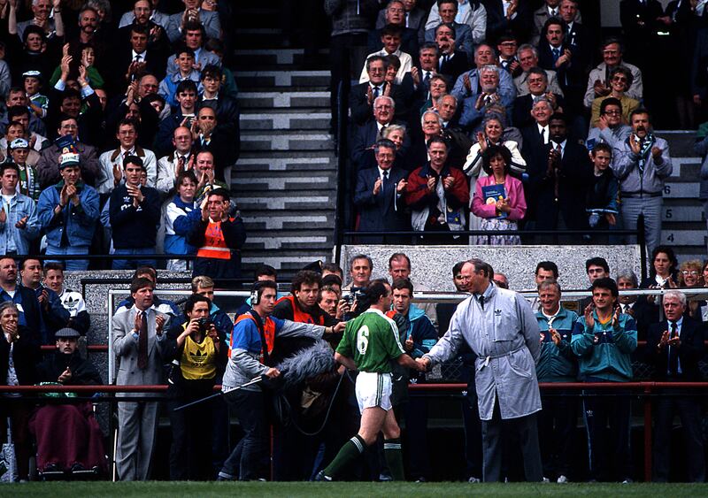 Liam Brady shakes hands with Ireland manager Jack Charlton on the occasion of the player's testimonial game against a visiting Finland in May 1990. Photograph: Lorraine O'Sullivan/Inpho 