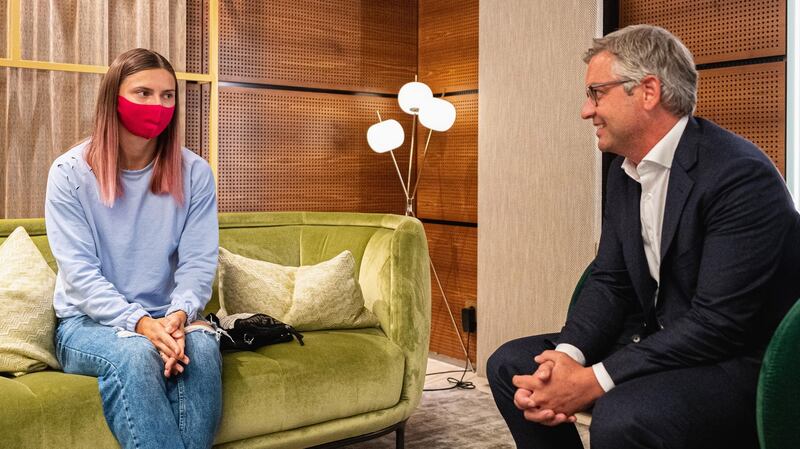 Belarusian athlete Krystsina Tsimanouskaya with Austrian state secretary Magnus Brunner  during a stopover in Vienna on Wednesday. Photograph: Florian Schroetter/EPA