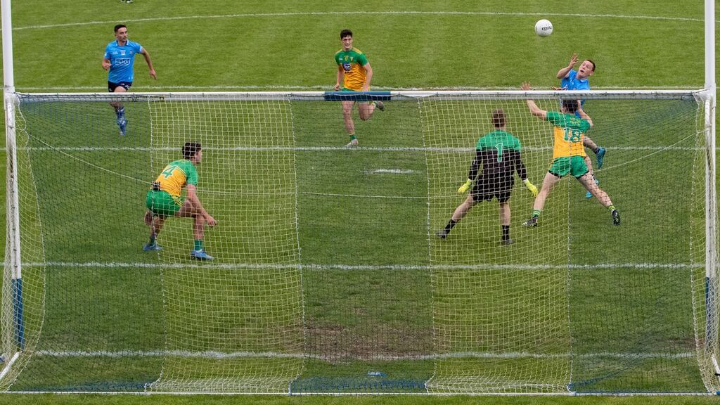 Dublin’s Con O’Callaghan fists over a point during their win over Donegal. Photo: Morgan Treacy/Inpho